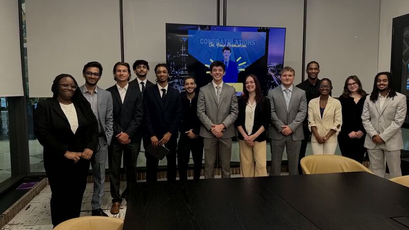Legacy Point Solutions team gathered in a Montgomeryville boardroom after a promotion announcement