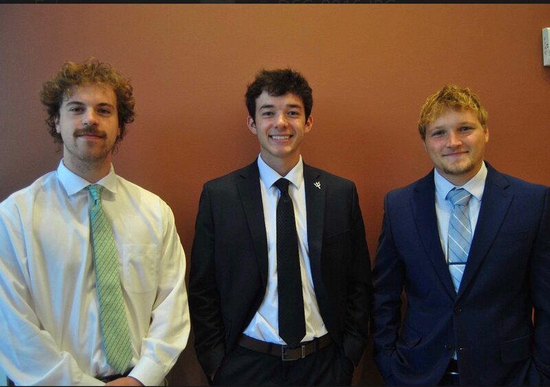 Three Legacy Point Solutions sales and marketing representatives in business attire